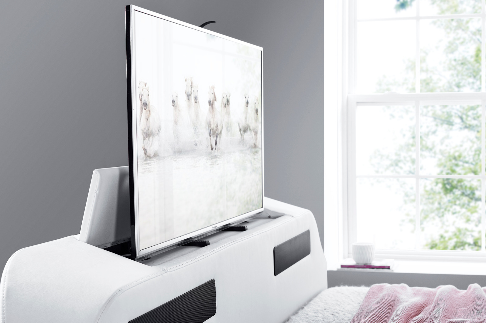 Creating the Perfect Entertainment Setup with Your Queen-Size TV Bed